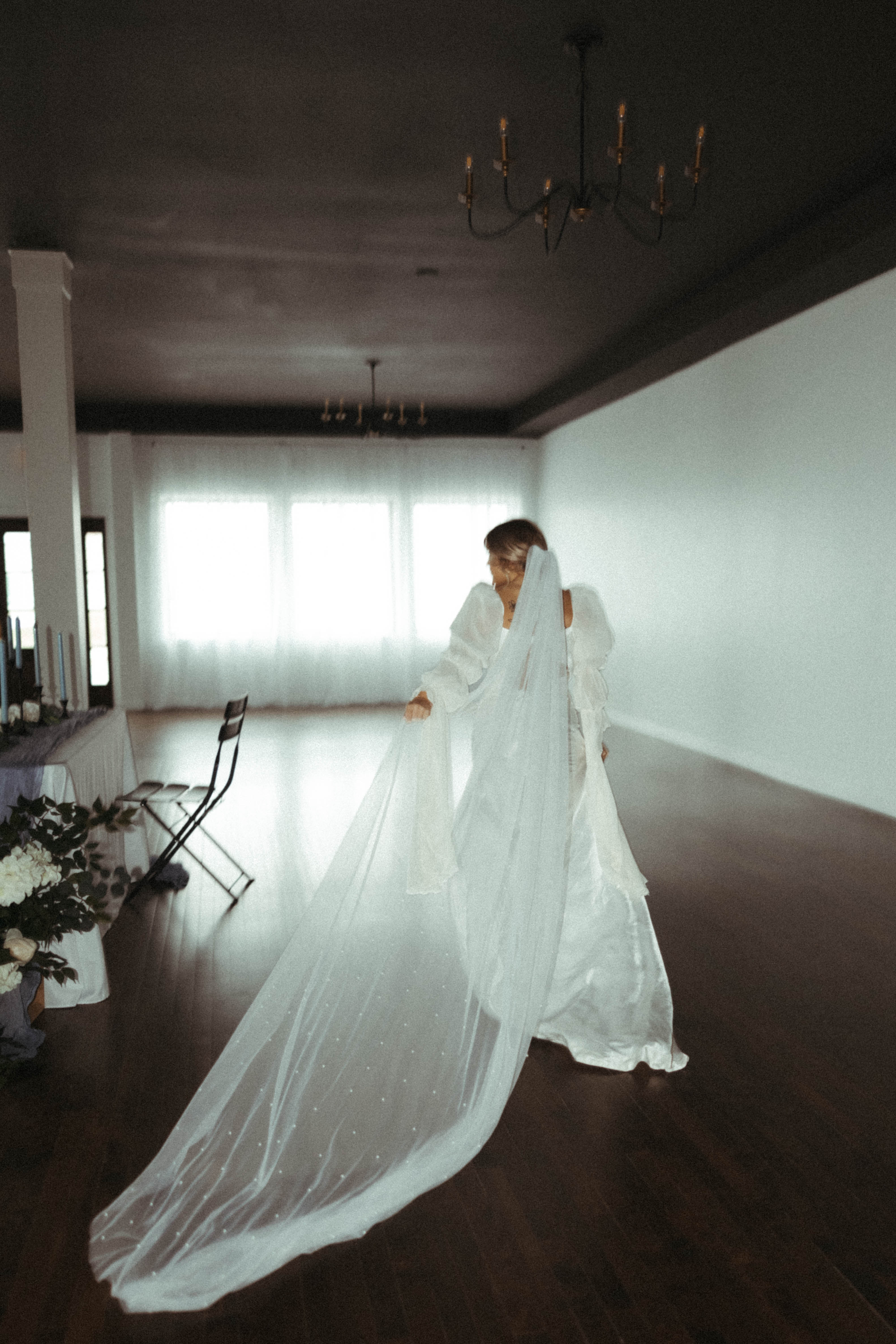 Bride in the full event room at Haley Station wedding venue, Escanaba Michigan