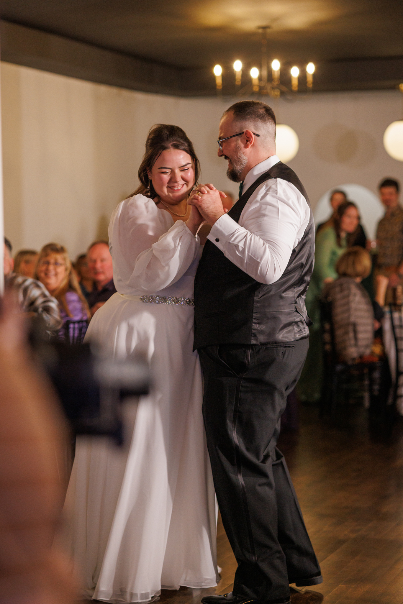 Bride and groom first dance at wedding reception at Haley Station, Escanaba Michigan