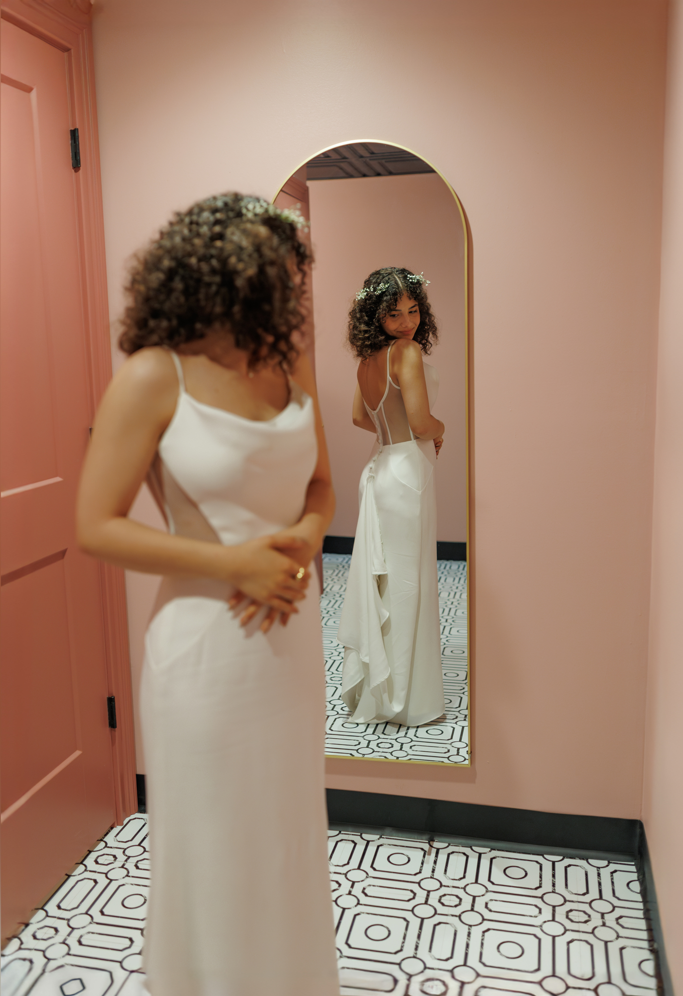 Bride at mirror at Haley Station wedding venue, Escanaba Michigan