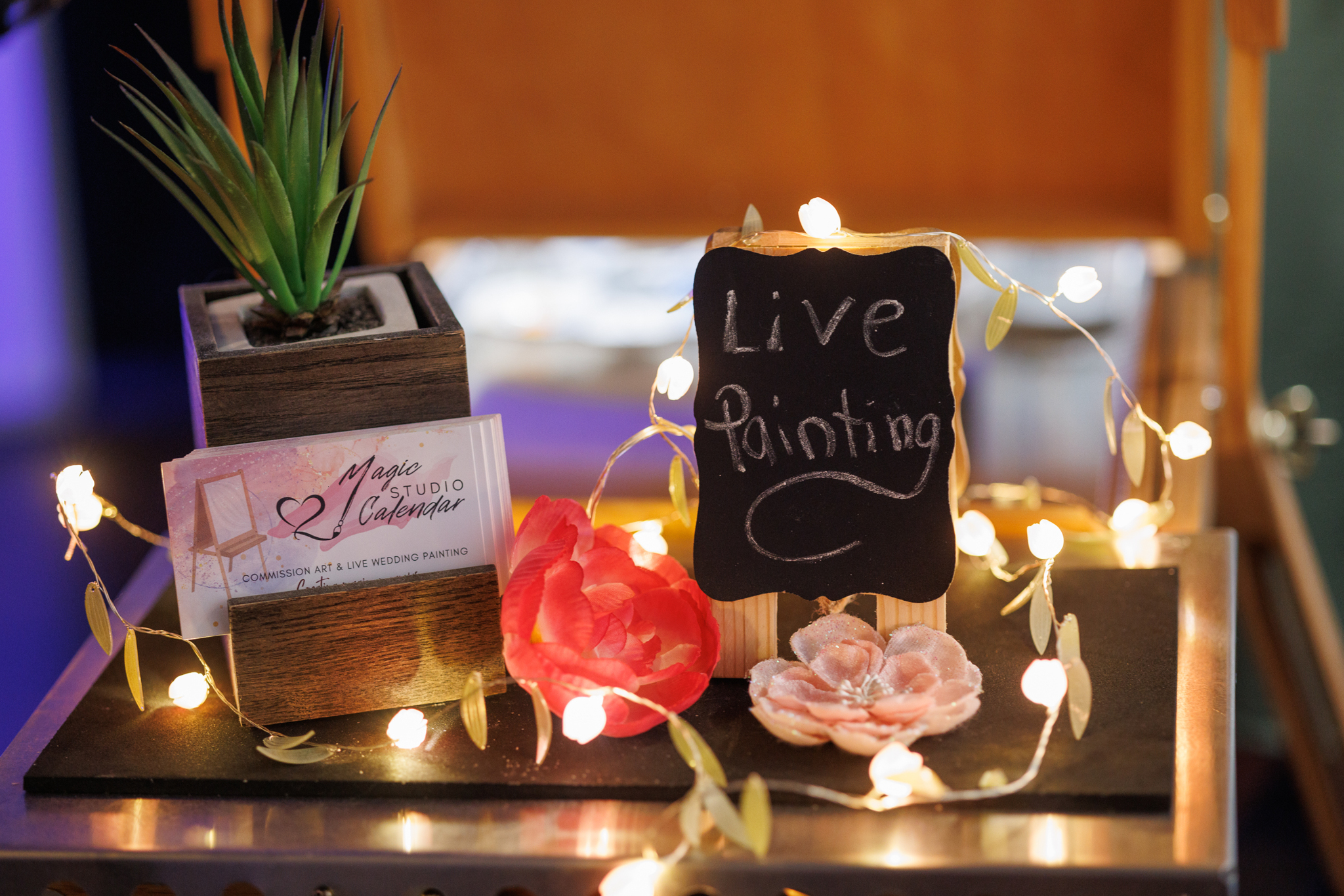Live painter at wedding reception at Haley Station, Escanaba Michigan